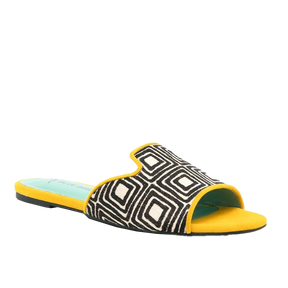 a pair of yellow and black slides with a black and white pattern